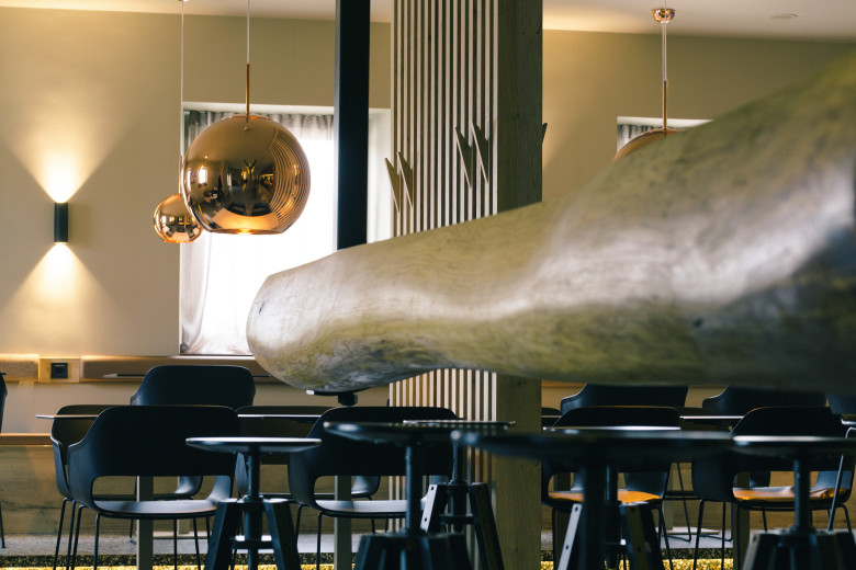copper-bar-sculptural-wooden-counter-and-bar-seating
