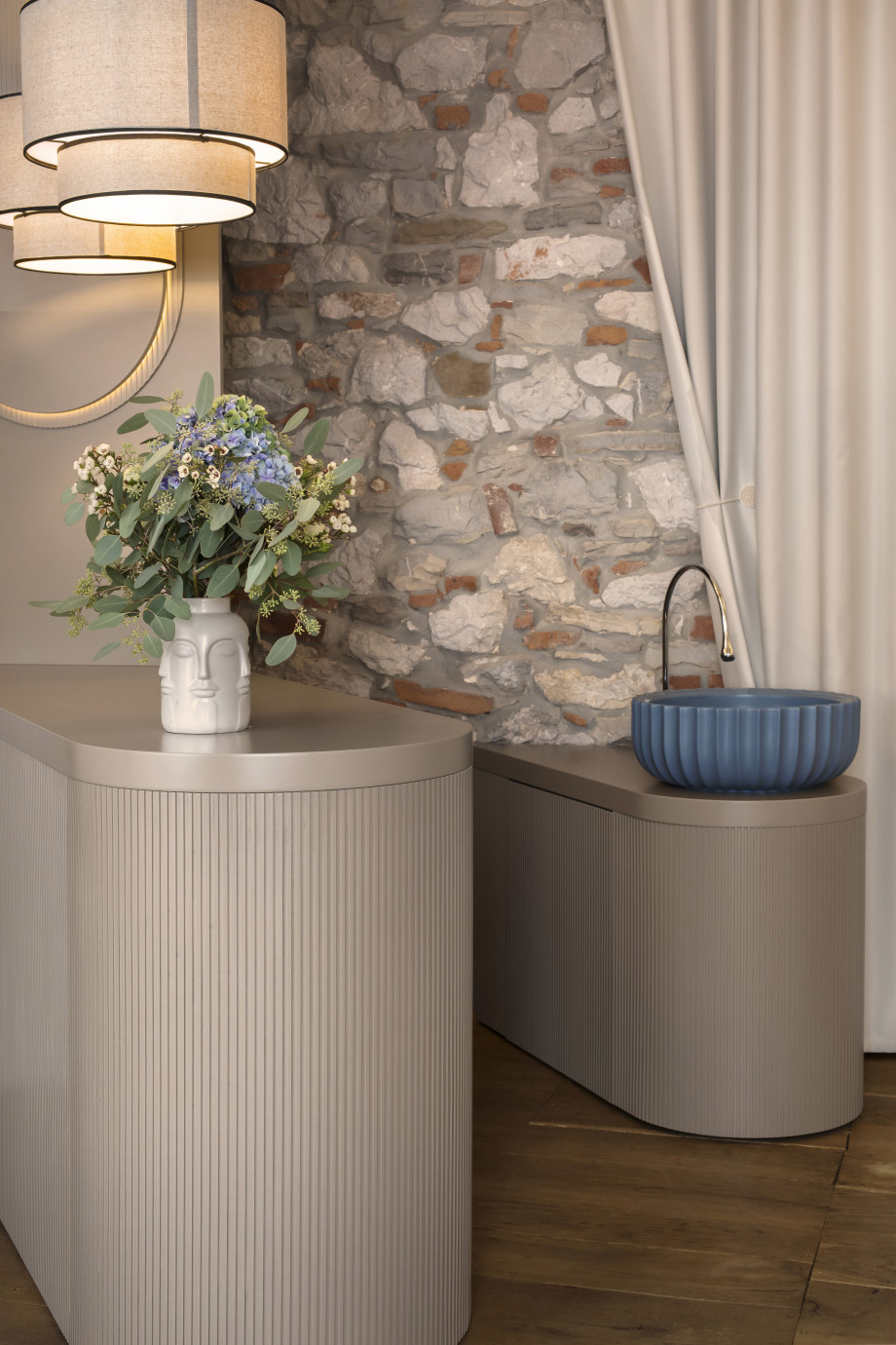 lumi-skin-blue-basin-and-stone-wall-detail